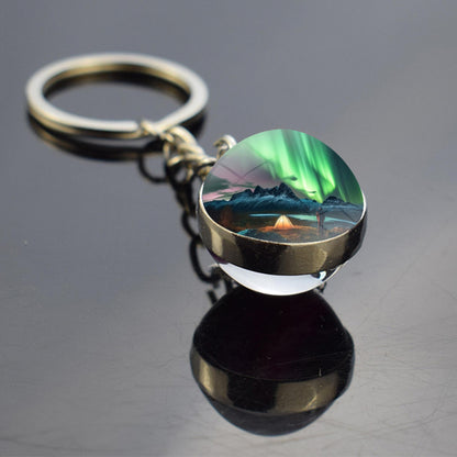 Lichtgevende Aurora Borealis sleutelhanger - Noorderlicht sieraden - Unieke dubbelzijdige glazen bal sleutelhanger - Perfect Aurora Lovers Gift