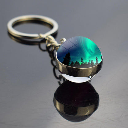 Lichtgevende Aurora Borealis sleutelhanger - Noorderlicht sieraden - Unieke dubbelzijdige glazen bal sleutelhanger - Perfect Aurora Lovers Gift