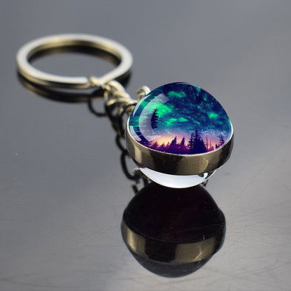 Lichtgevende Aurora Borealis sleutelhanger - Noorderlicht sieraden - Unieke dubbelzijdige glazen bal sleutelhanger - Perfect Aurora Lovers Gift