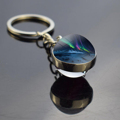 Lichtgevende Aurora Borealis sleutelhanger - Noorderlicht sieraden - Unieke dubbelzijdige glazen bal sleutelhanger - Perfect Aurora Lovers Gift