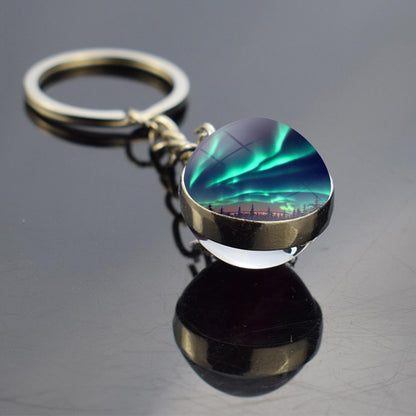 Lichtgevende Aurora Borealis sleutelhanger - Noorderlicht sieraden - Unieke dubbelzijdige glazen bal sleutelhanger - Perfect Aurora Lovers Gift