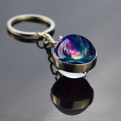 Lichtgevende Aurora Borealis sleutelhanger - Noorderlicht sieraden - Unieke dubbelzijdige glazen bal sleutelhanger - Perfect Aurora Lovers Gift