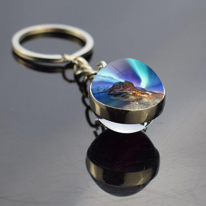 Lichtgevende Aurora Borealis sleutelhanger - Noorderlicht sieraden - Unieke dubbelzijdige glazen bal sleutelhanger - Perfect Aurora Lovers Gift