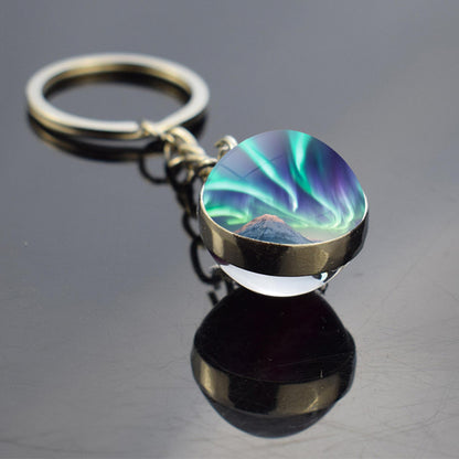 Lichtgevende Aurora Borealis sleutelhanger - Noorderlicht sieraden - Unieke dubbelzijdige glazen bal sleutelhanger - Perfect Aurora Lovers Gift